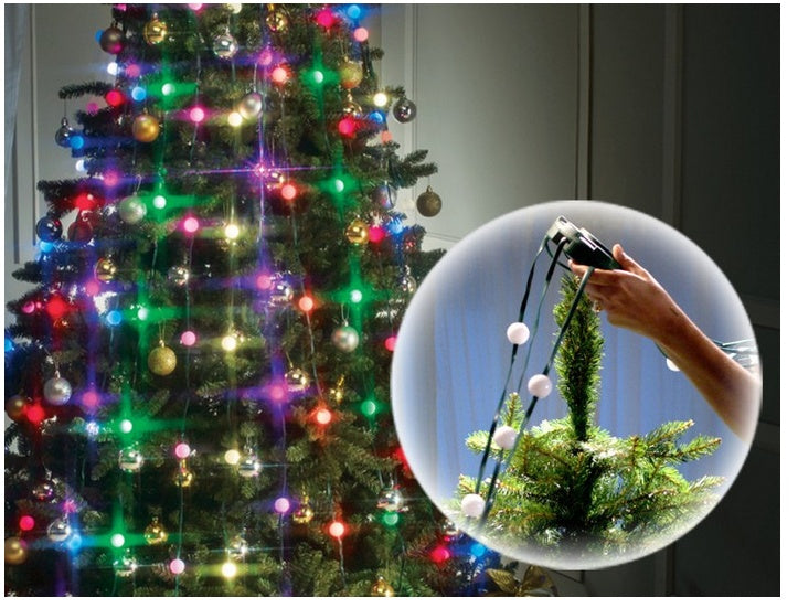 LED Christmas tree lights illuminating a festive tree with colorful ornaments and a hand adjusting the string lights.
