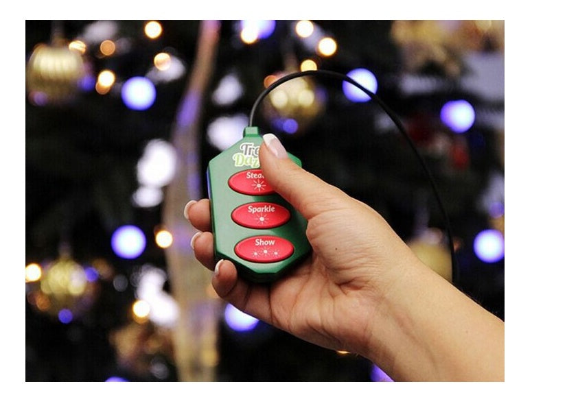 Hand holding a remote control for LED Christmas tree lights, showcasing options to set effects for festive decorations.